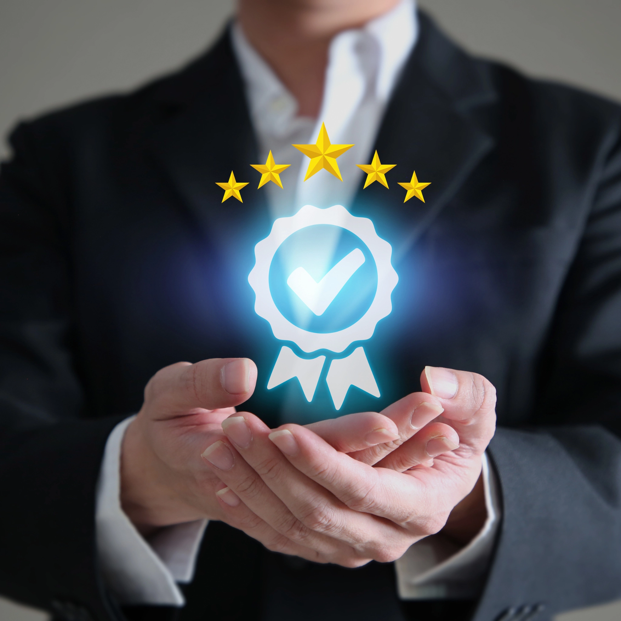 Businessman presenting certified badge for quality assurance services.